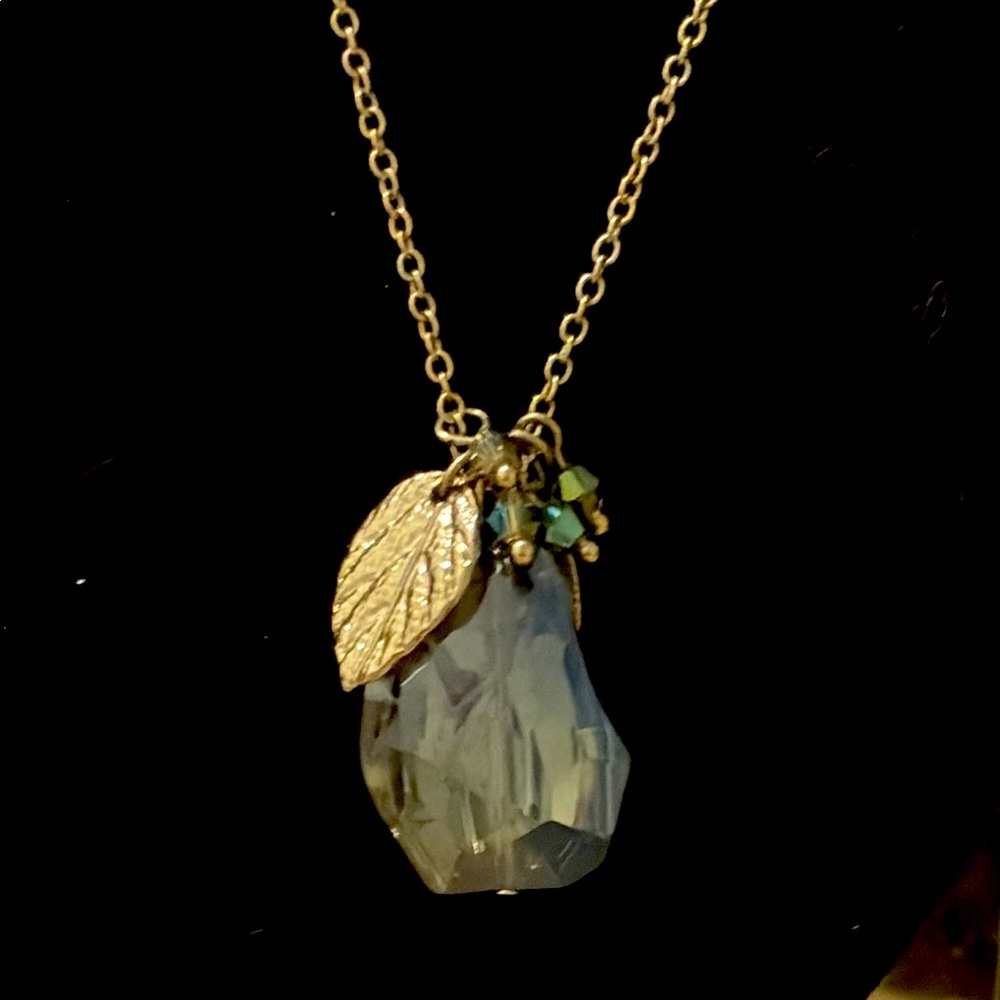 Made to look like a PEAR that you eat Aurora crystal necklace, brass tone